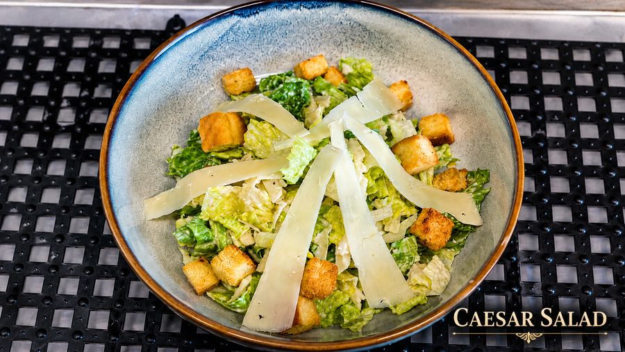 Caesar salad with shaved parmesan and croutons
