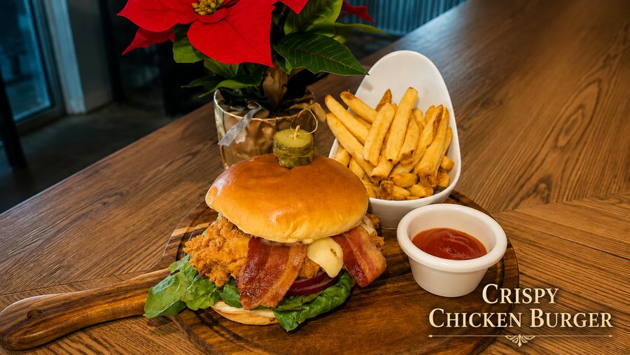 Crispy chicken burger with bacon, cheese and fries
