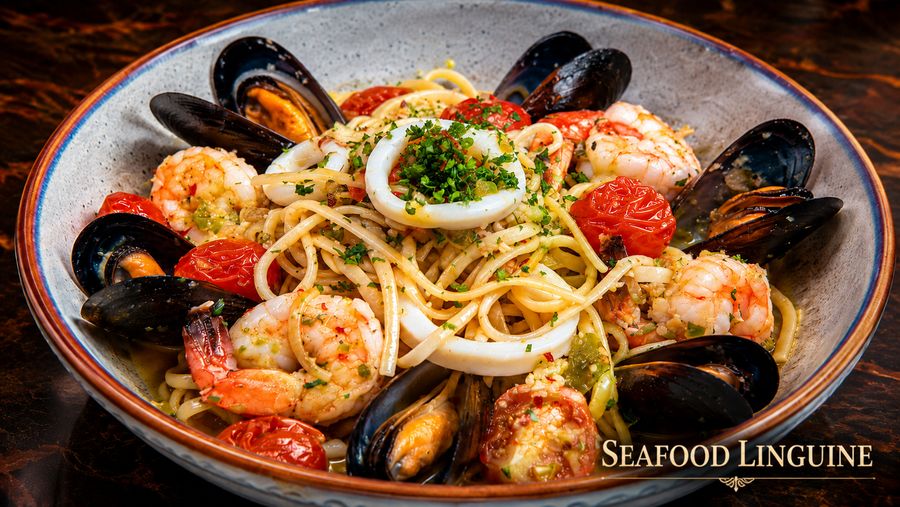 Seafood linguine with shrimp, mussels, calamari and cherry tomatoes